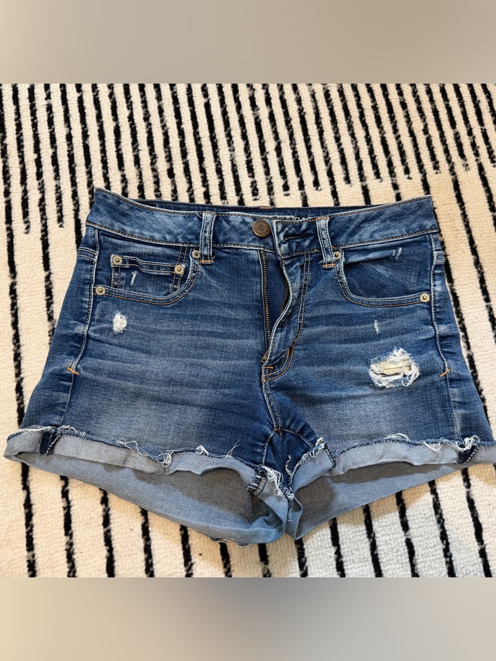 AE Women’s Dark Blue Distressed Denim Shorts